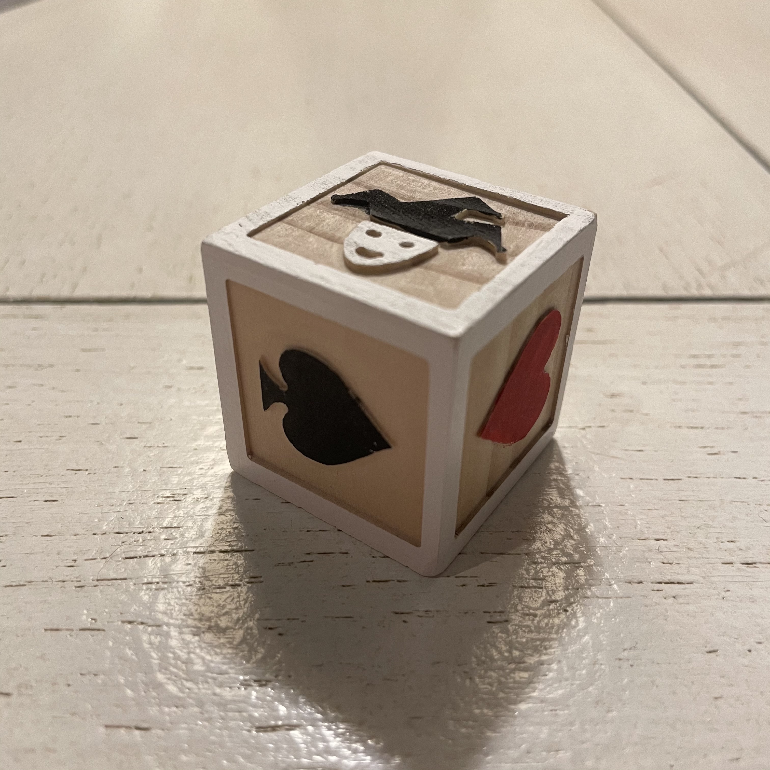 Picture of a painted Euchre cube