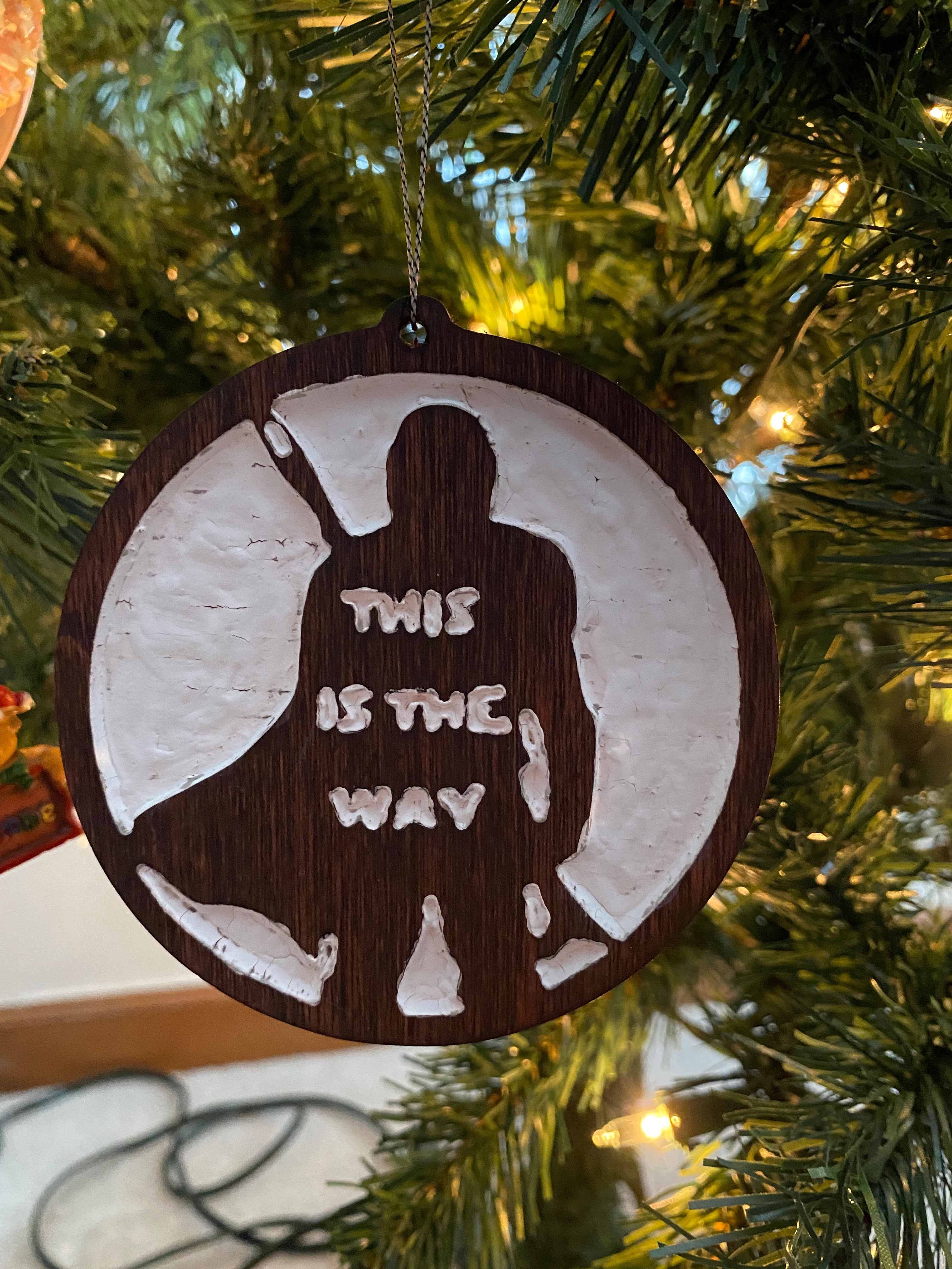 Picture of an ornament with the Mandalorian on it